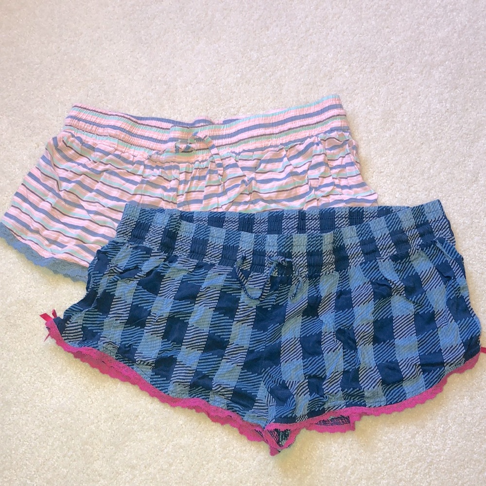 Two-pack sleep shorts w/ lace detailing. Size Med